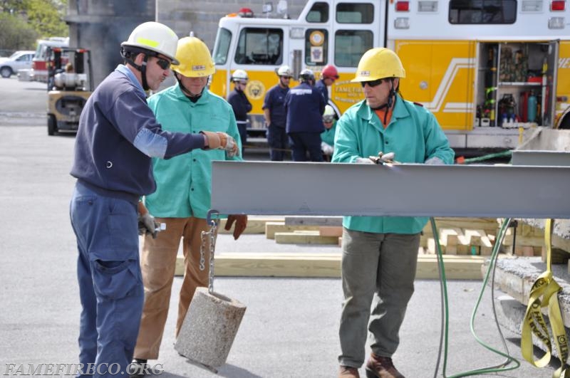 FF/Technician Kim Norsoph receives instructions on torch operations at a recent FEMA USAR Structural Collapse Technician (SCT) Course.